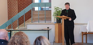 kidd speaks during a function at the university Chaplaincy Center, where she serves.