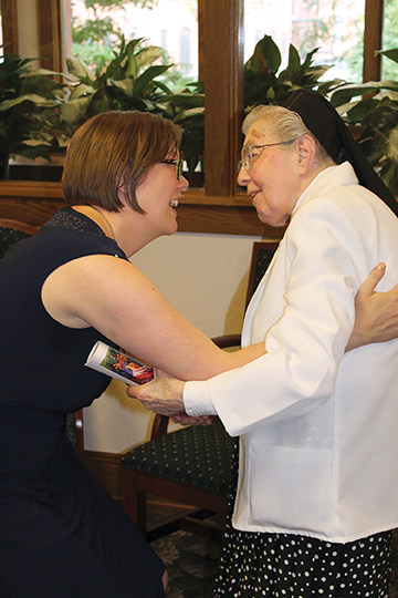 Vision 2017 Walsh 3 Celibacy leads me Walsh and Sister Rita Marie Bechel, F.S.P.A. share a hug