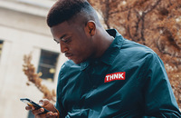 Young man looking at cell phone